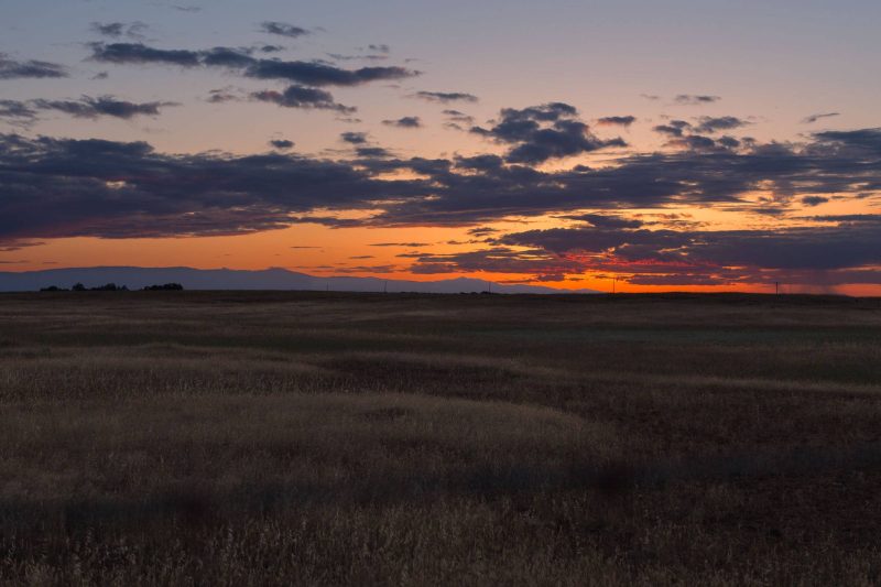 Vibrant colors during sunset with a rainstorm visible in the distance from a view in Upper Bidwell Park, 2015